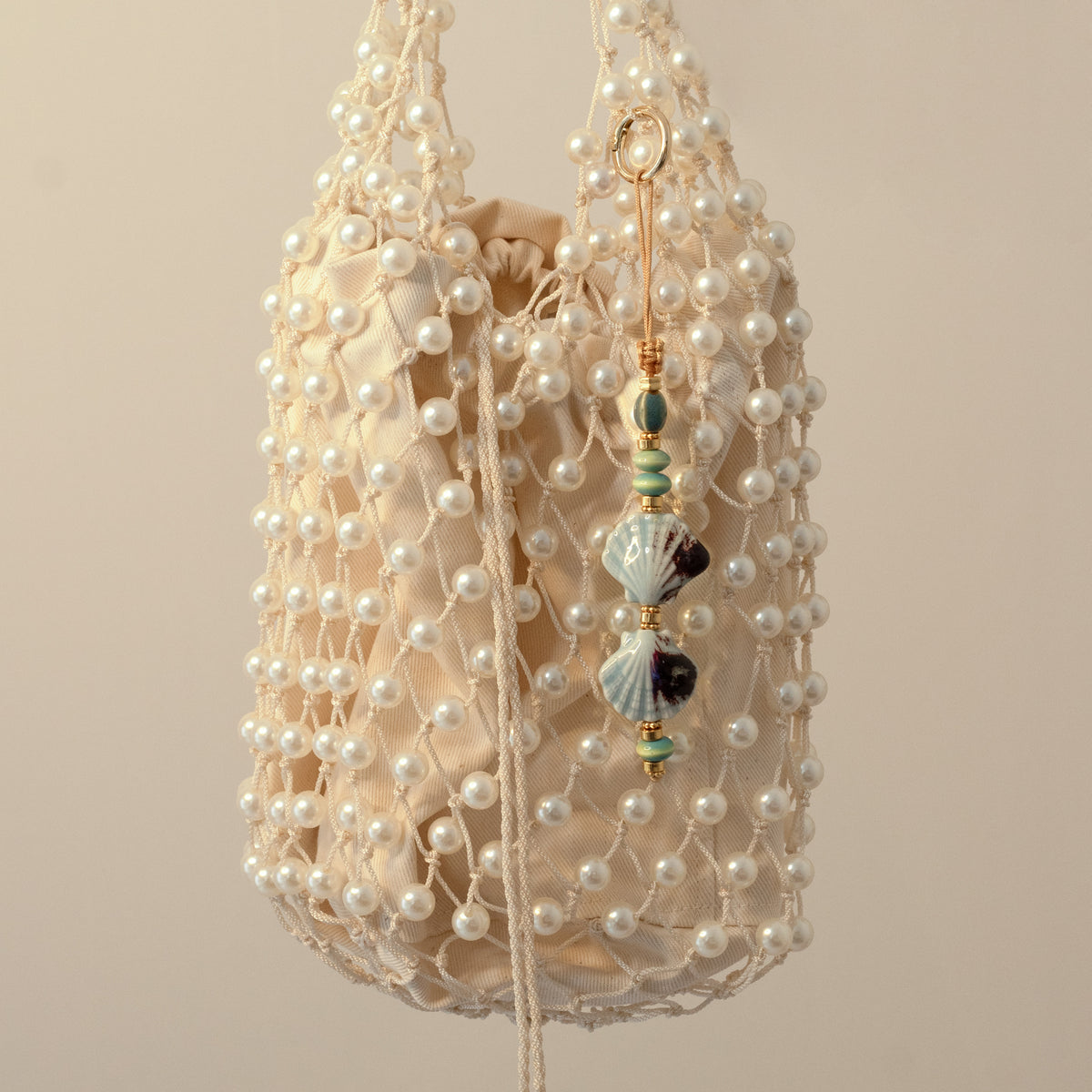 LLAVERO BAUBLE SHELL